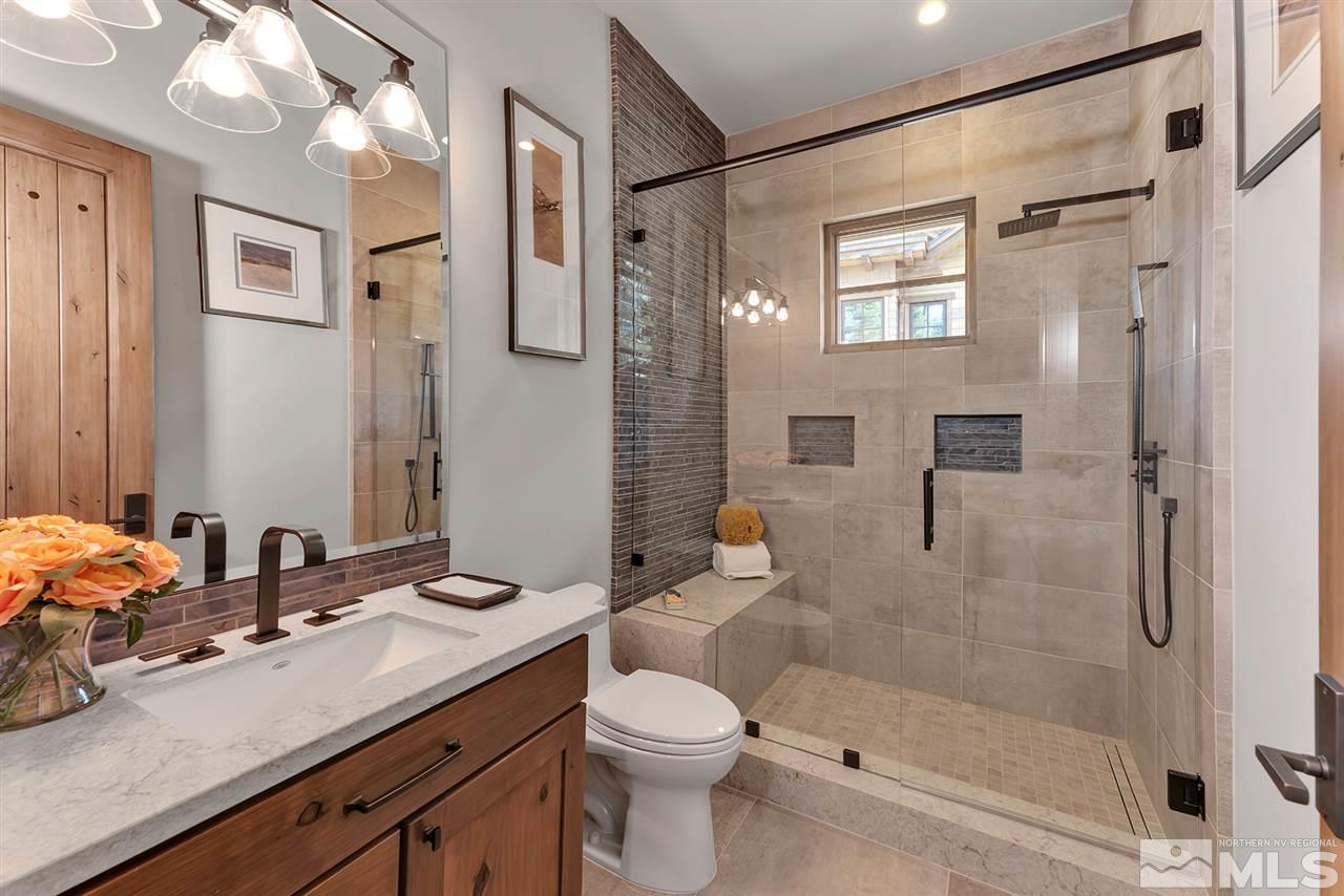 249 Mill Race Loop Carson City, NV 89705 - Photo 25 of 40 a bathroom with a sink a toilet and shower