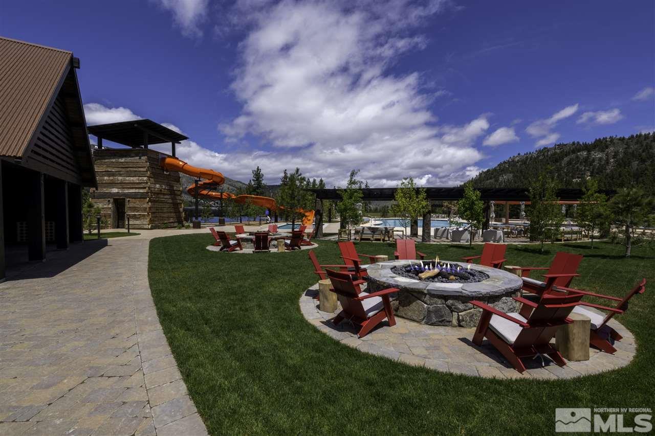 249 Mill Race Loop Carson City, NV 89705 - Photo 34 of 40 a view of a backyard with table and chairs and a fire pit