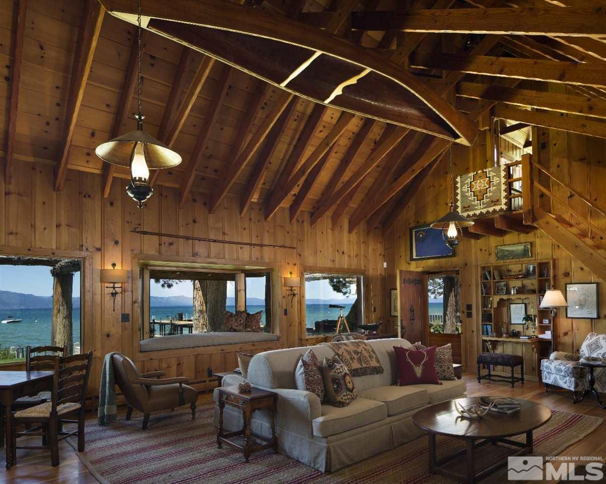 249 Mill Race Loop Carson City, NV 89705 - Photo 38 of 40 a living room with furniture a ceiling fan and a chandelier