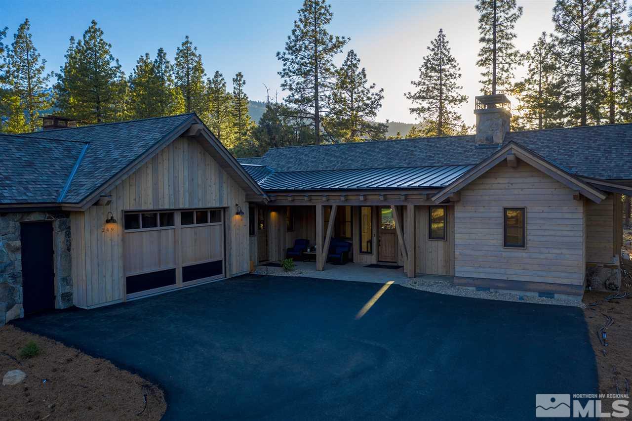 249 Mill Race Loop Carson City, NV 89705 - Photo 7 of 40 a view of a house with a yard