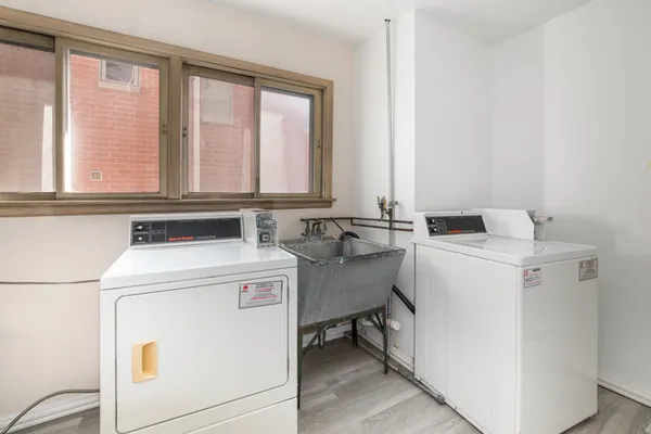 a utility room with dryer and washer