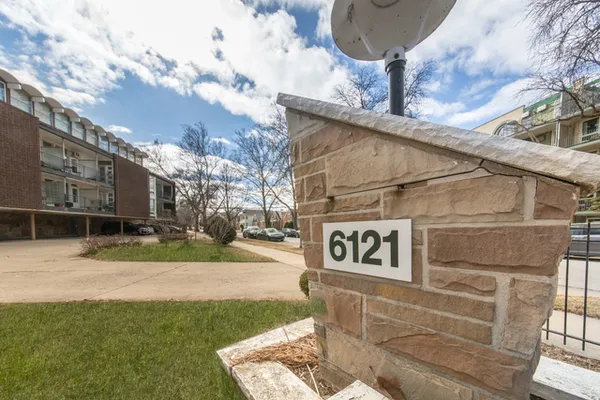 a sign that is on the side of a building