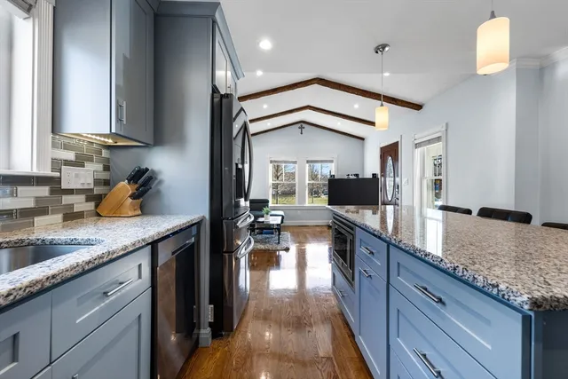 a kitchen with granite countertop lots of counter top space
