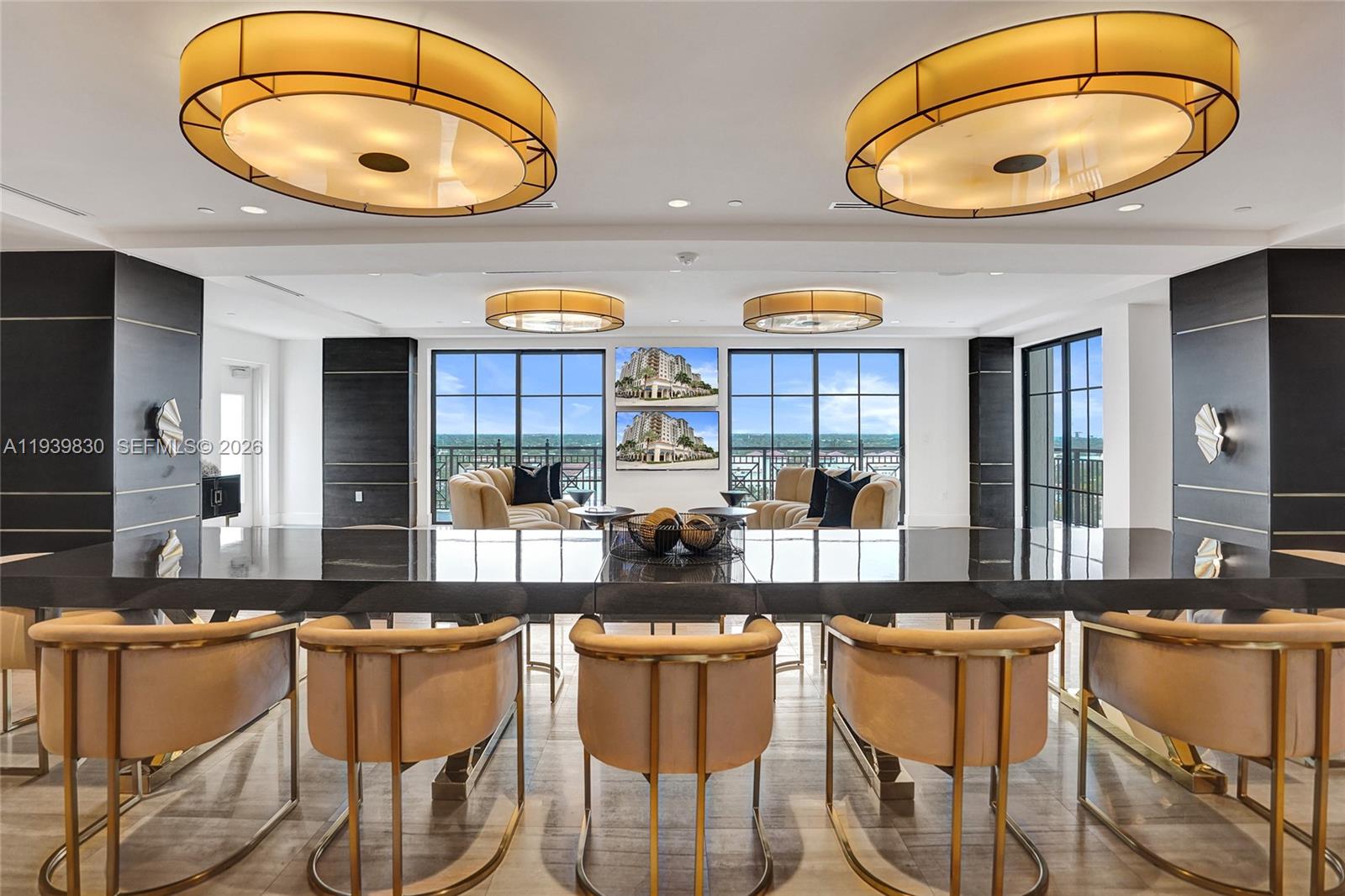 101 East Camino Real, Unit PH07 Boca Raton, FL 33432 - Photo 29 of 43 a kitchen with a table and chairs