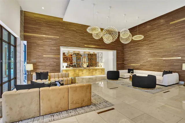 a living room with furniture and large window