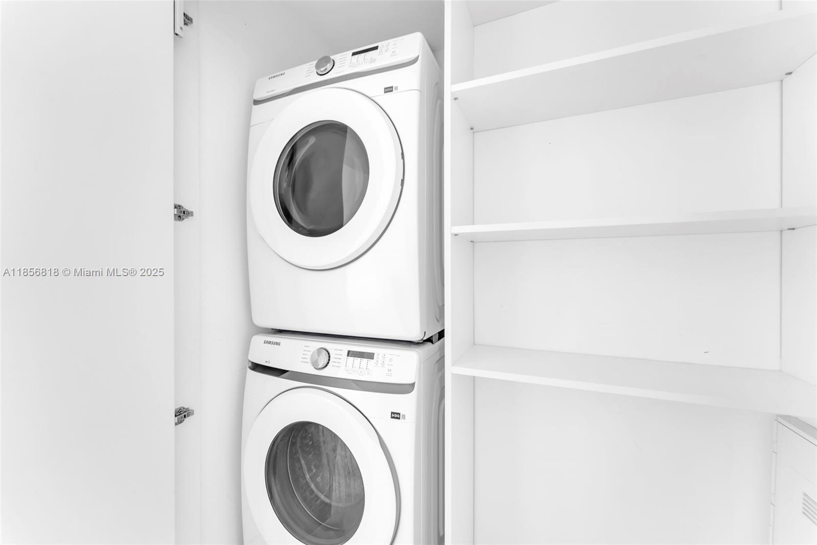 700 Northeast 24th Street, Unit 2002 Miami, FL 33137 - Photo 17 of 36 a utility room with dryer and washer