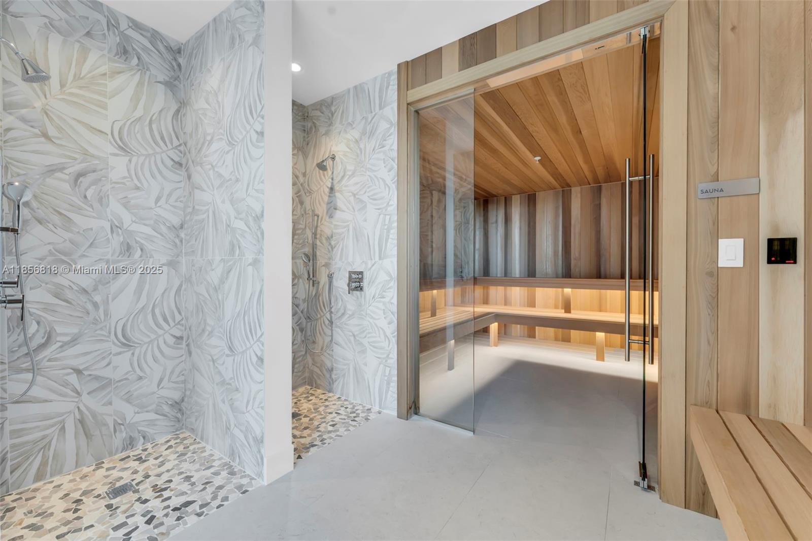 700 Northeast 24th Street, Unit 2002 Miami, FL 33137 - Photo 23 of 36 a bathroom with a tub and shower