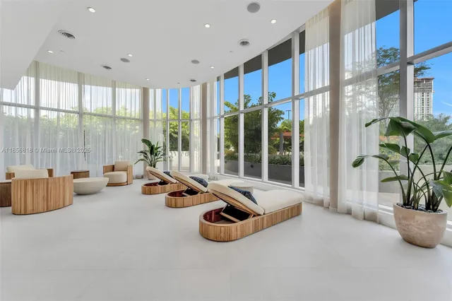 a view of an empty room with a balcony