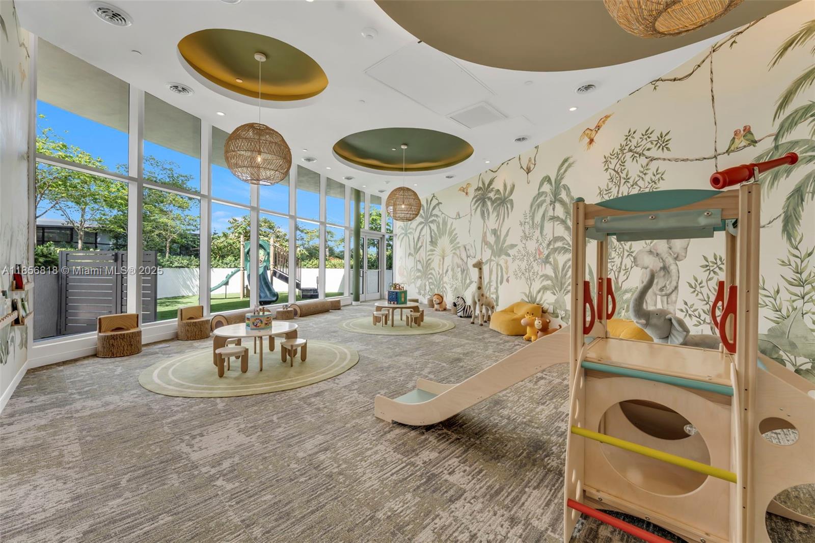 700 Northeast 24th Street, Unit 2002 Miami, FL 33137 - Photo 29 of 36 a view of a dining room with furniture and chandelier