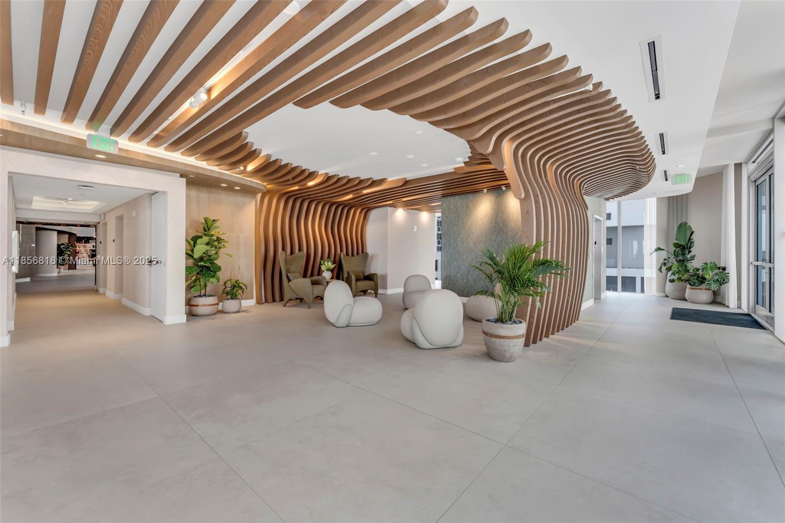 700 Northeast 24th Street, Unit 2002 Miami, FL 33137 - Photo 31 of 36 a view of an entryway with table and chairs