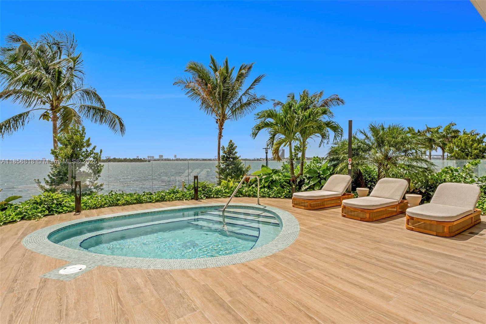 700 Northeast 24th Street, Unit 2002 Miami, FL 33137 - Photo 34 of 36 a view of a swimming pool with a patio