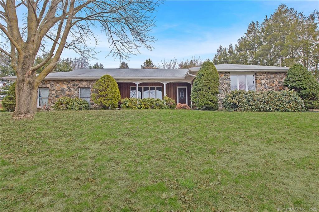 46 Paugassett Road Derby, CT 06418 - Photo 1 of 1 a view of a yard in front of a house