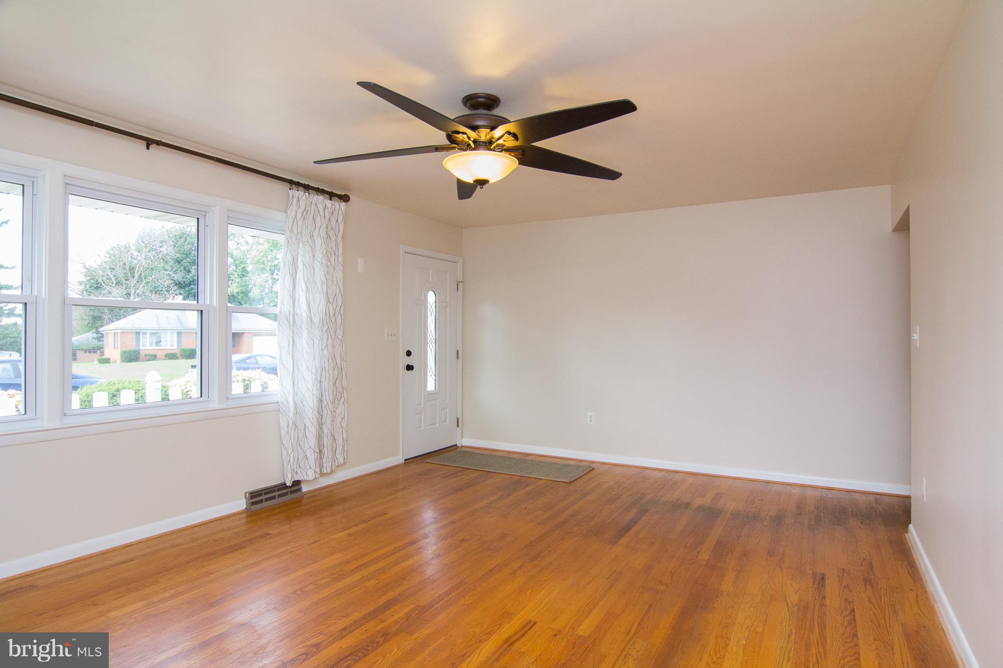 522 Old Baltimore Road Westminster, MD 21157 - Photo 5 of 30 Living Room WITH GLEAMING HARDWOOD FLOORS