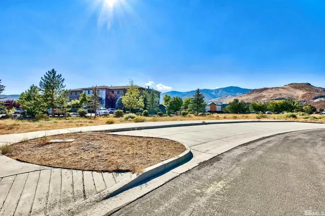 a view of swimming pool with a terrace seating