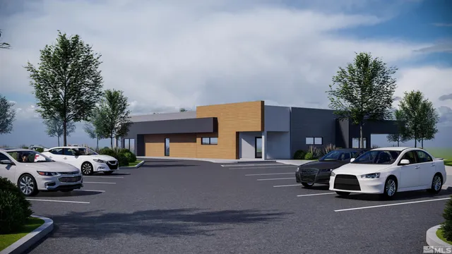 a view of a cars park in front of a house