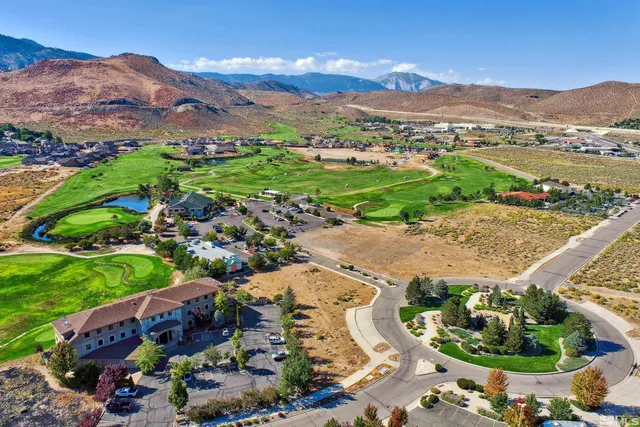 an aerial view of residential house and outdoor space