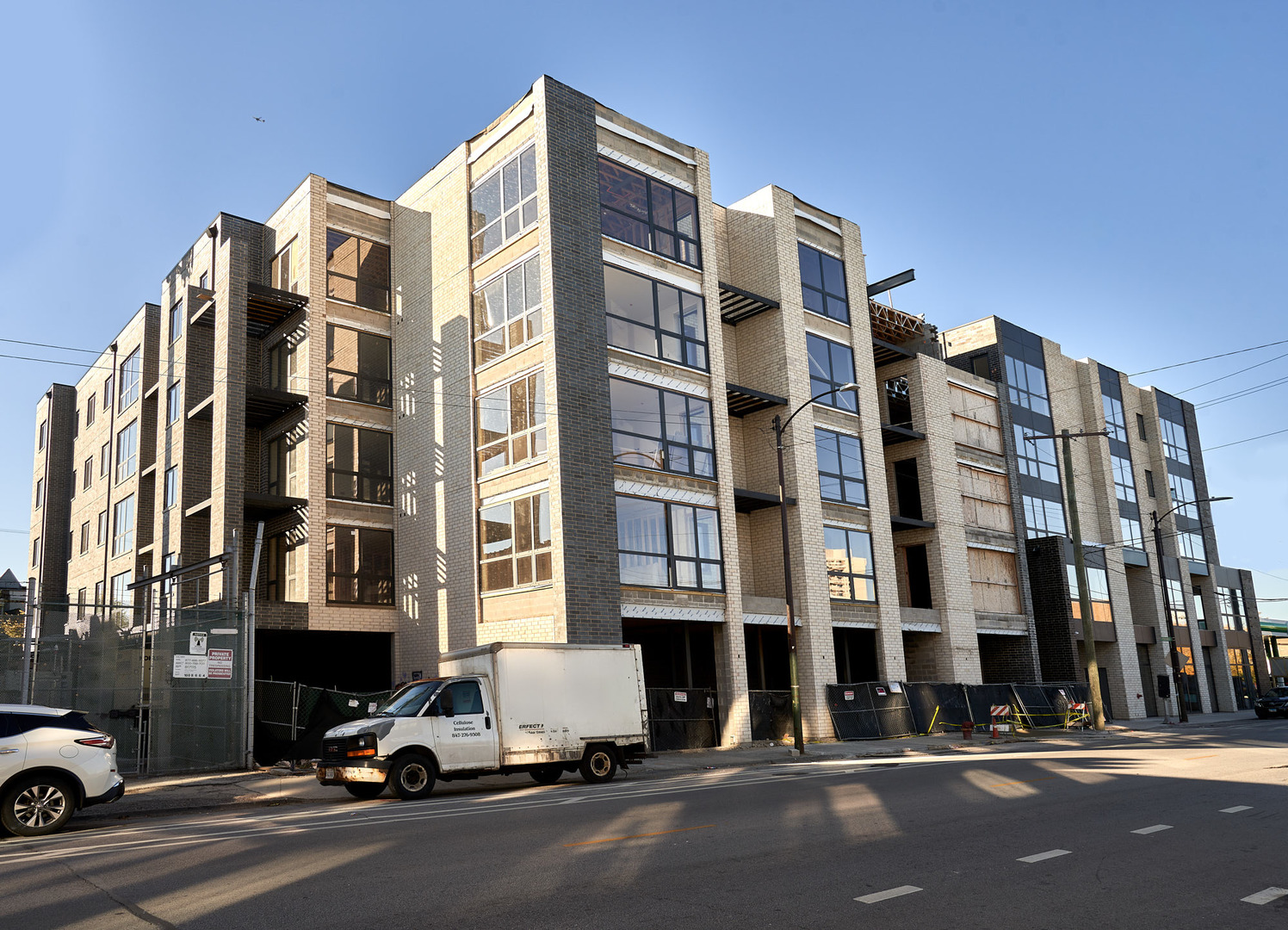 451 East Pershing Road, Unit 305 Chicago, IL 60653 - Photo 1 of 3 front view of a building with a street