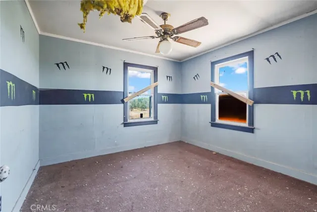 a view of a kitchen with a sink and cabinets