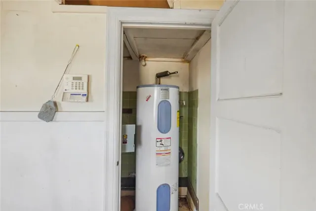 a view of a hallway view with wooden floor and staircase