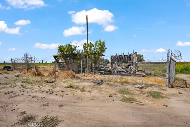 a view of a chairs and tables in the patio