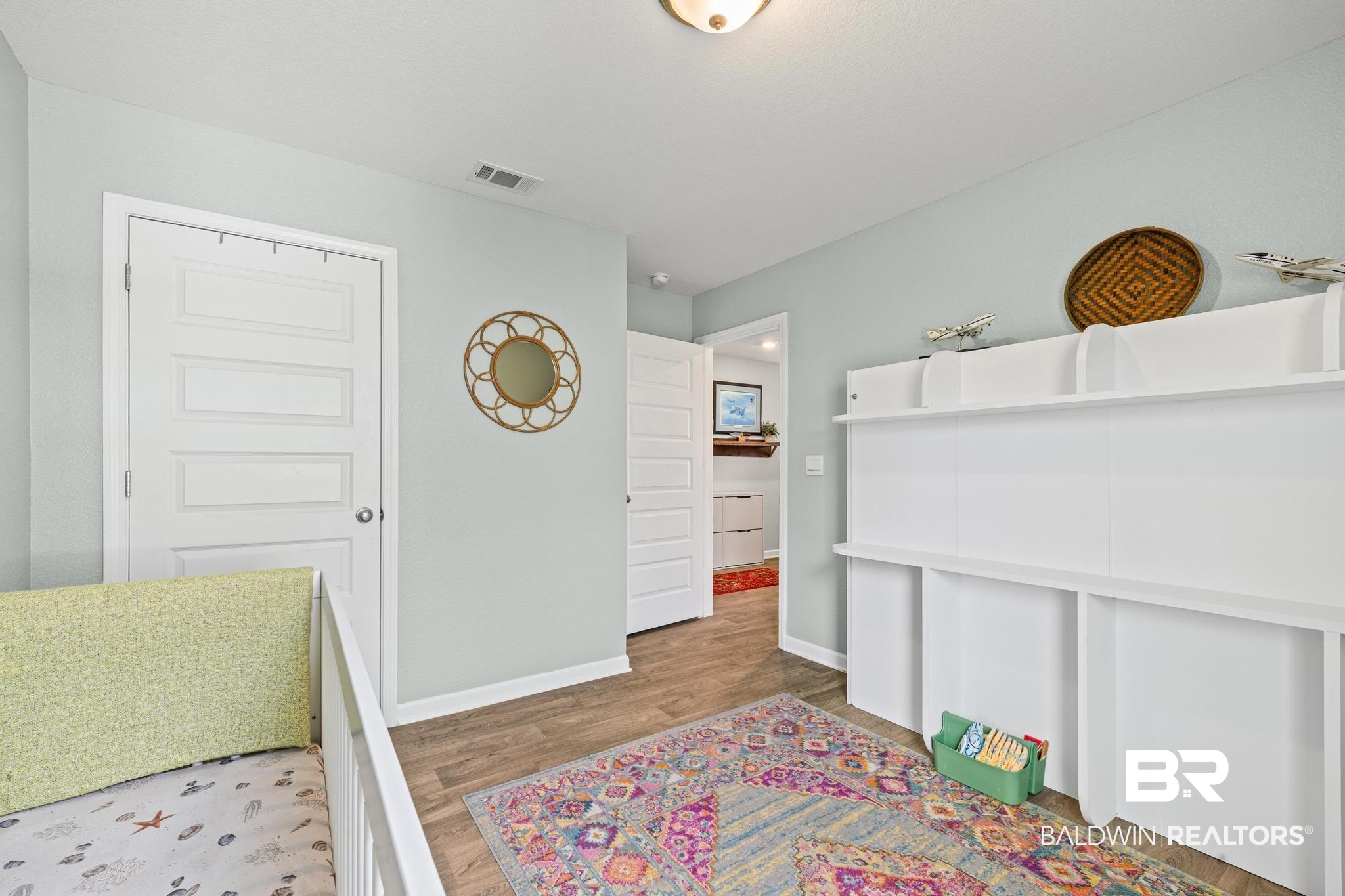 3078 Camino Real Loop Lillian, AL 36549 - Photo 18 of 51 Bedroom with dark wood-type flooring and baseboards