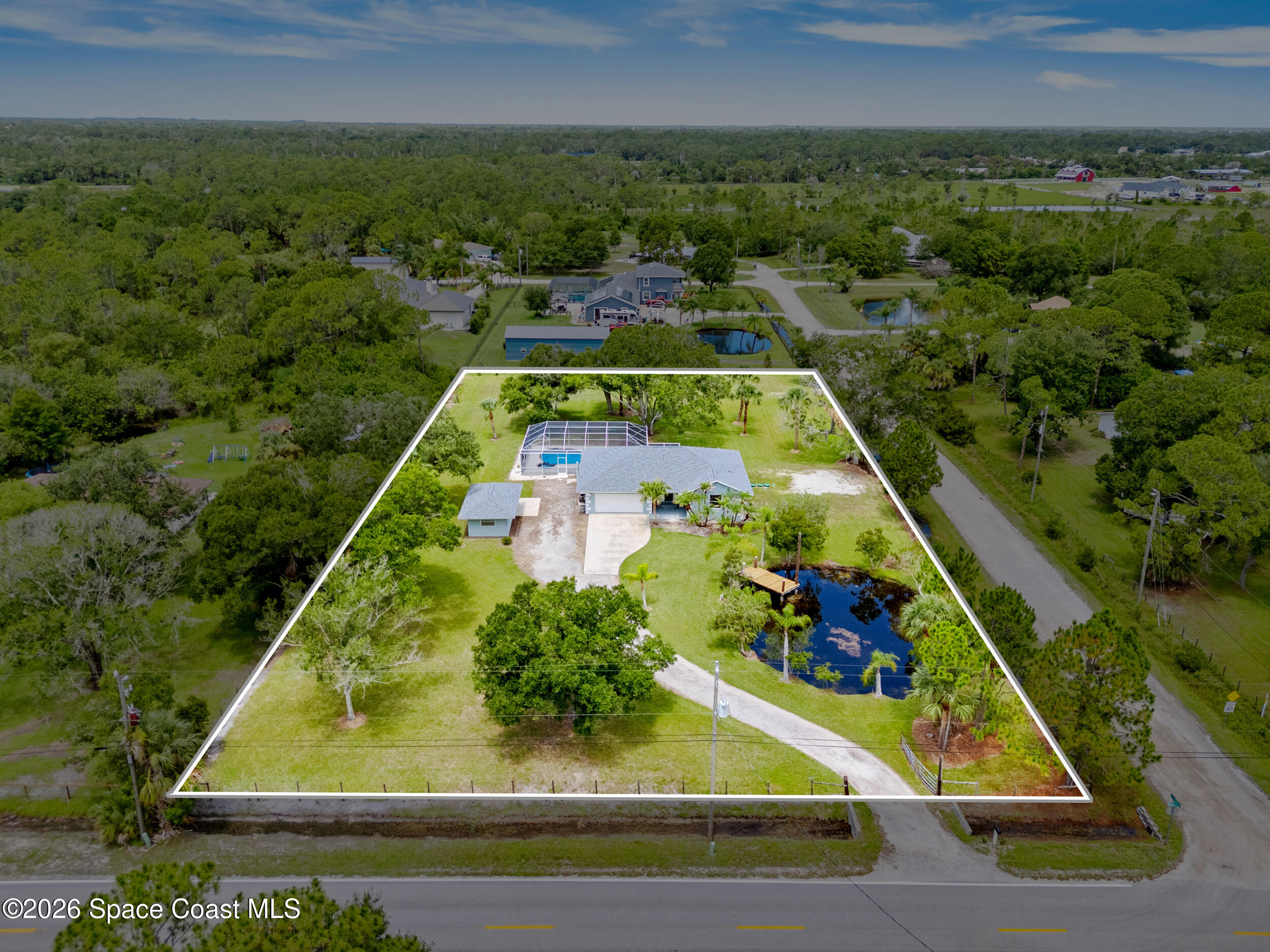 3480 Weber Road Malabar, FL 32950 - Photo 1 of 45 an aerial view of a pool