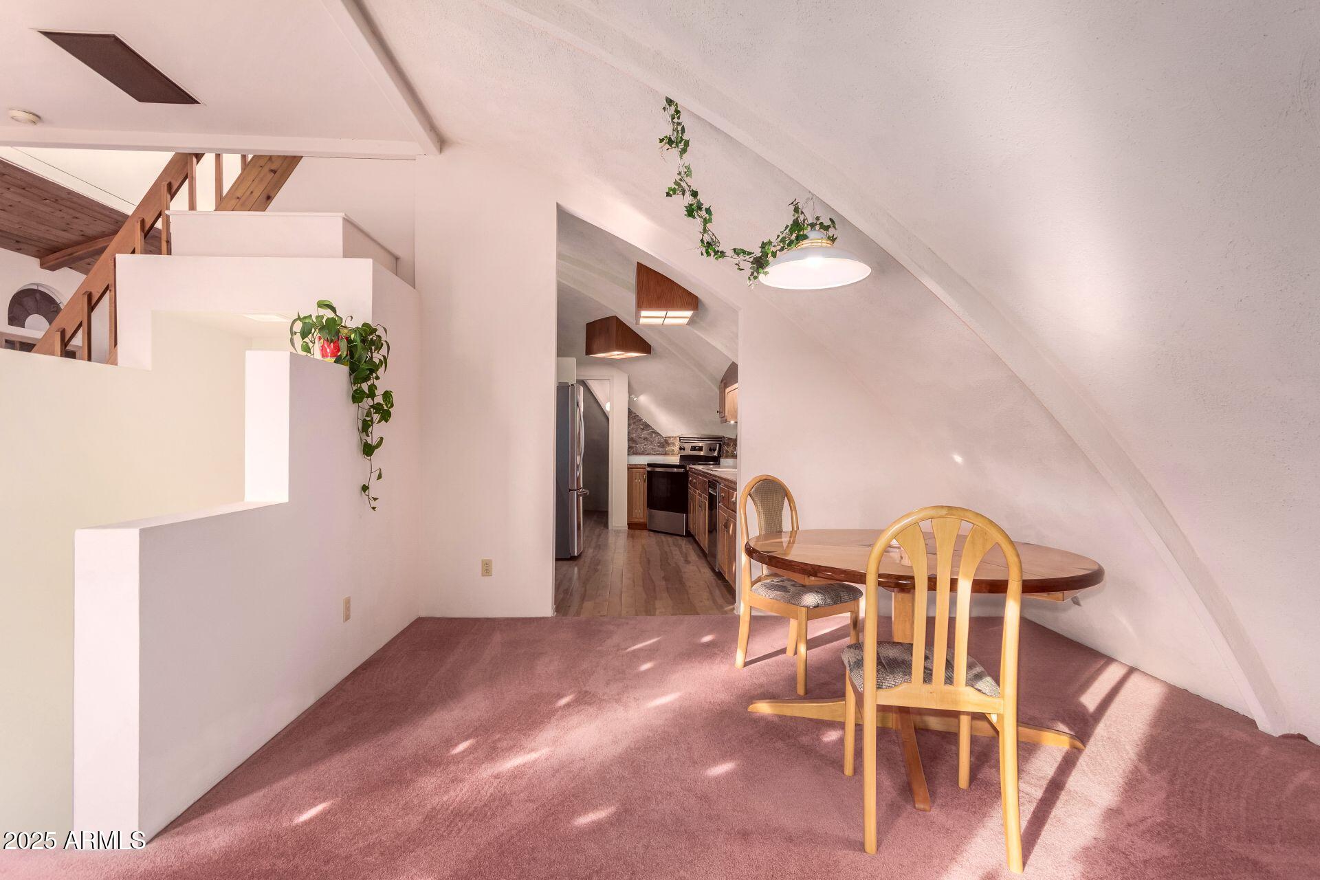 412 West Joy Ranch Road Phoenix, AZ 85086 - Photo 11 of 71 a dining room with furniture and chandelier