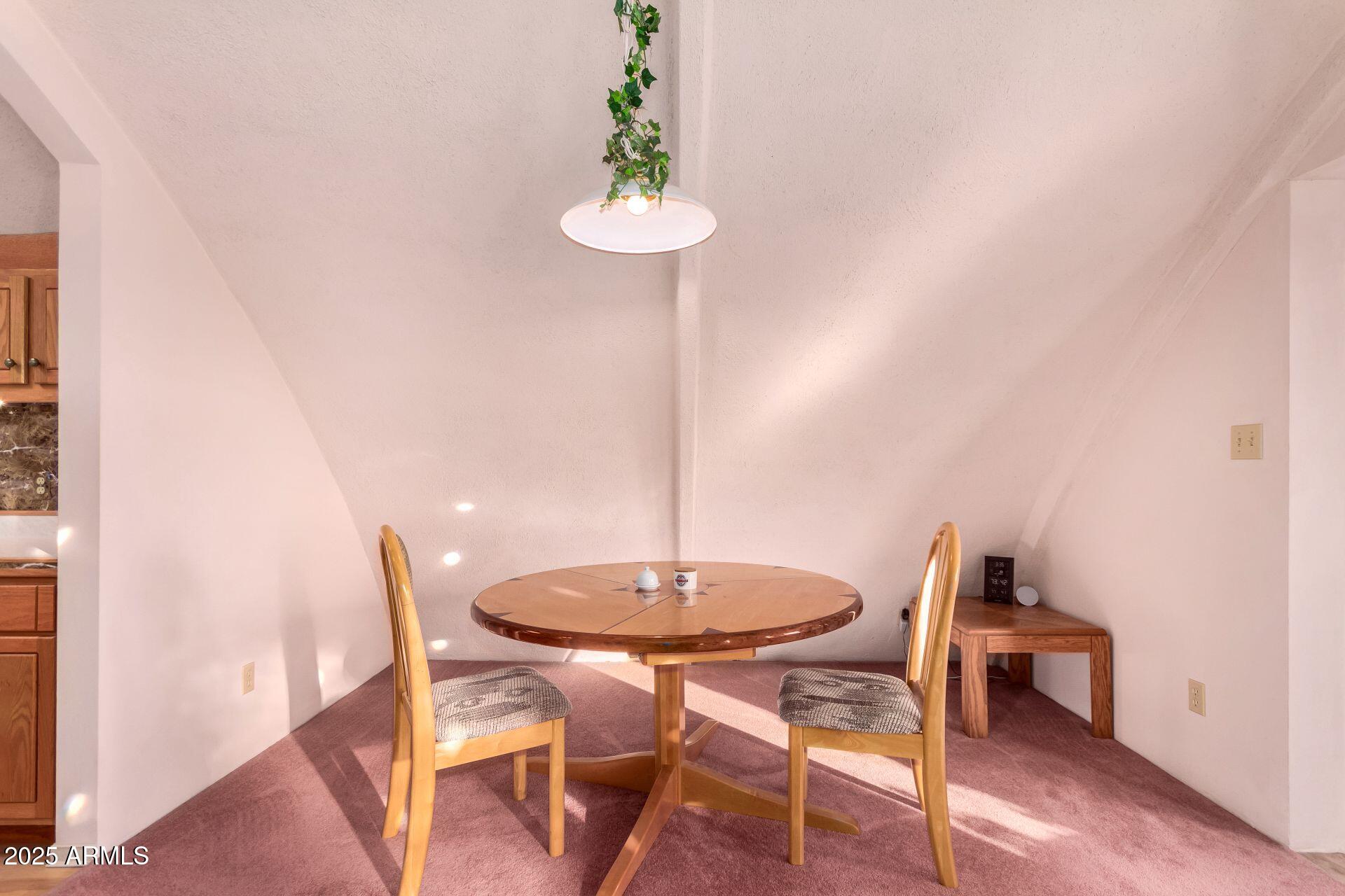 412 West Joy Ranch Road Phoenix, AZ 85086 - Photo 18 of 71 a table and chairs in a room