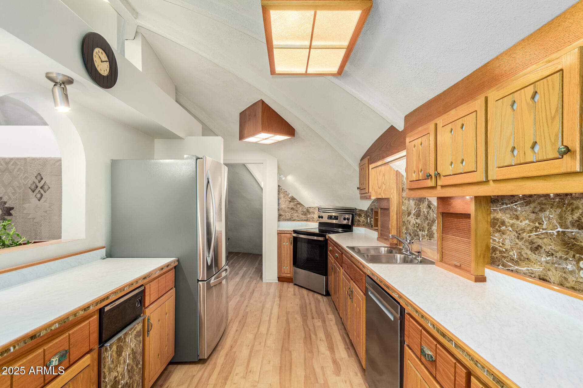 412 West Joy Ranch Road Phoenix, AZ 85086 - Photo 19 of 71 a kitchen with stainless steel appliances granite countertop a stove and a sink