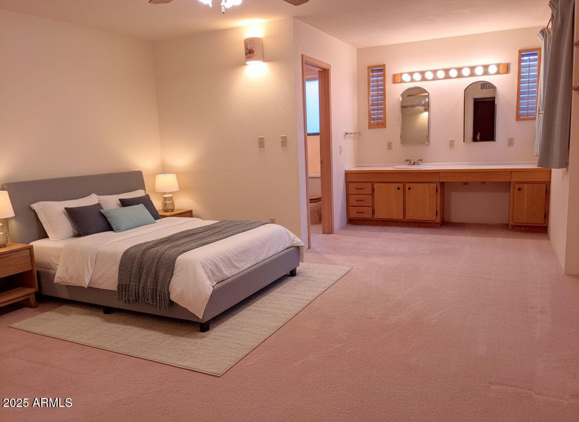 412 West Joy Ranch Road Phoenix, AZ 85086 - Photo 23 of 71 a spacious bedroom with a bed and a view of living room