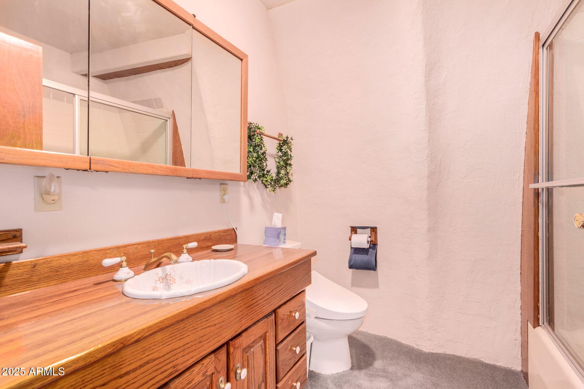 412 West Joy Ranch Road Phoenix, AZ 85086 - Photo 31 of 71 a bathroom with a sink and a mirror