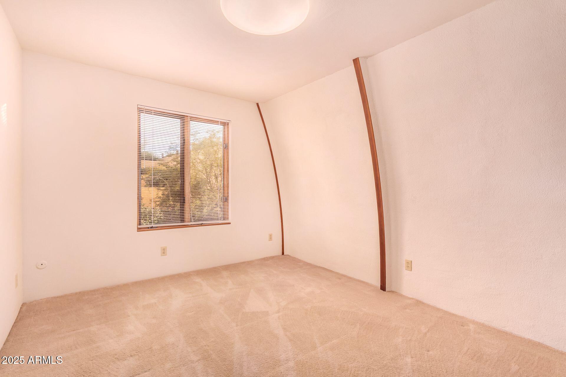412 West Joy Ranch Road Phoenix, AZ 85086 - Photo 32 of 71 a view of an empty room with a window