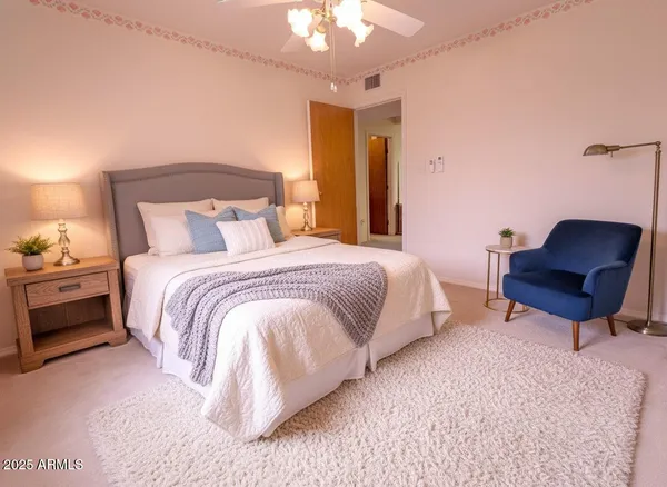a room with pool table and chandelier