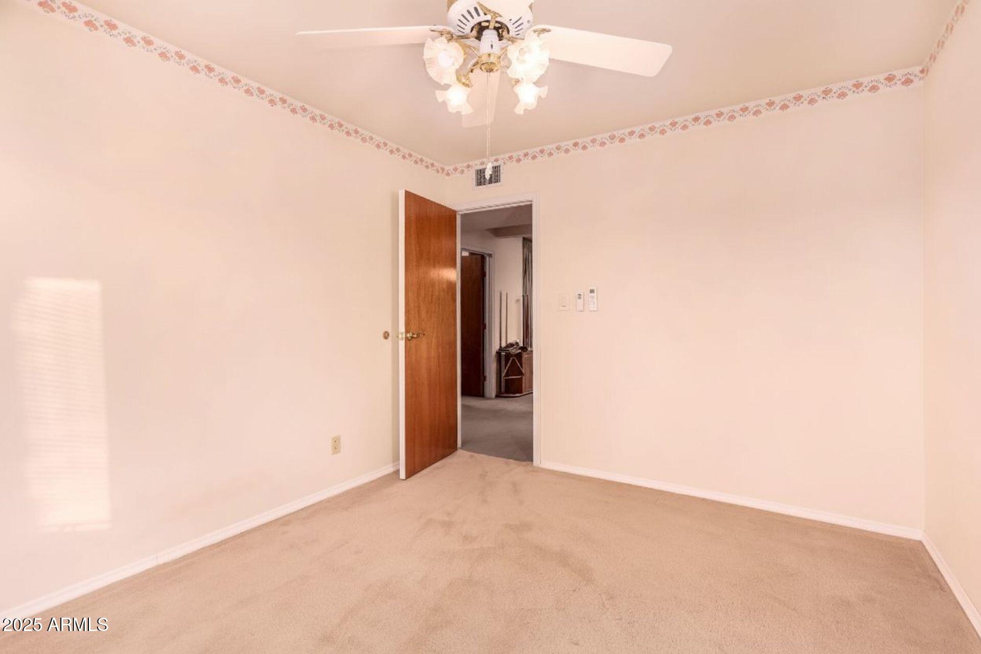 412 West Joy Ranch Road Phoenix, AZ 85086 - Photo 37 of 71 a view of a chandelier fan in a room