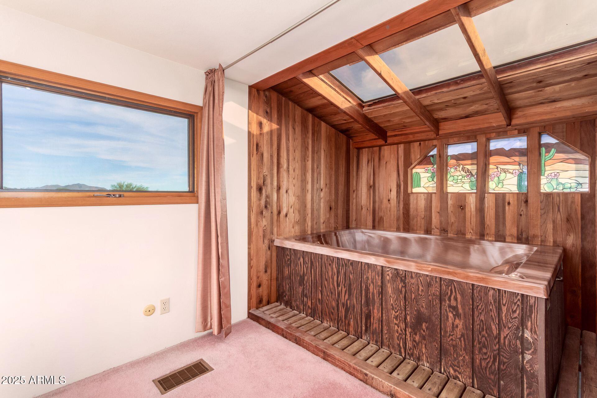412 West Joy Ranch Road Phoenix, AZ 85086 - Photo 43 of 71 a view of a room with wooden floor