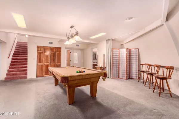 a view of a car park in front of house