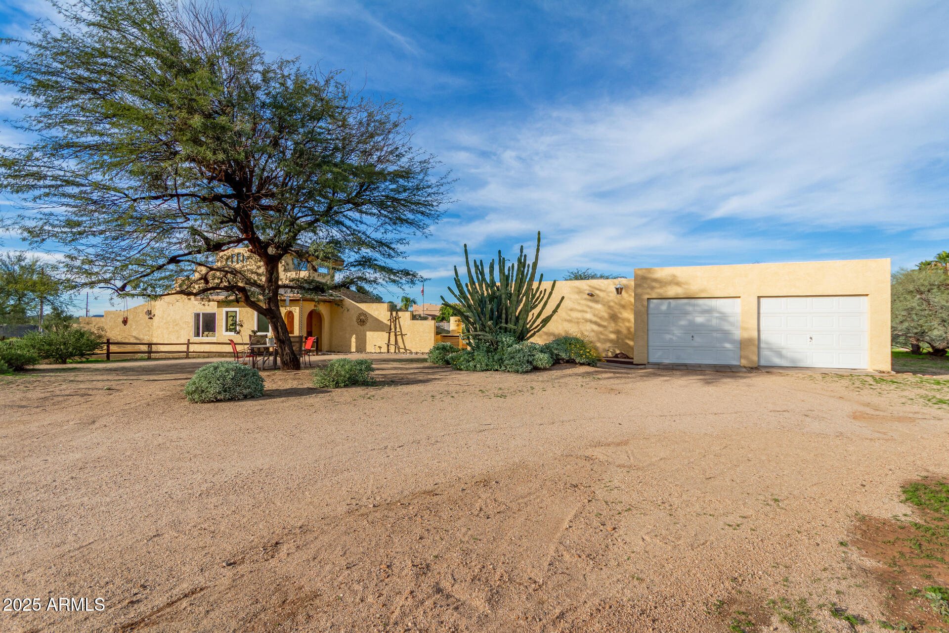 412 West Joy Ranch Road Phoenix, AZ 85086 - Photo 5 of 71 a view of large tree with house in background