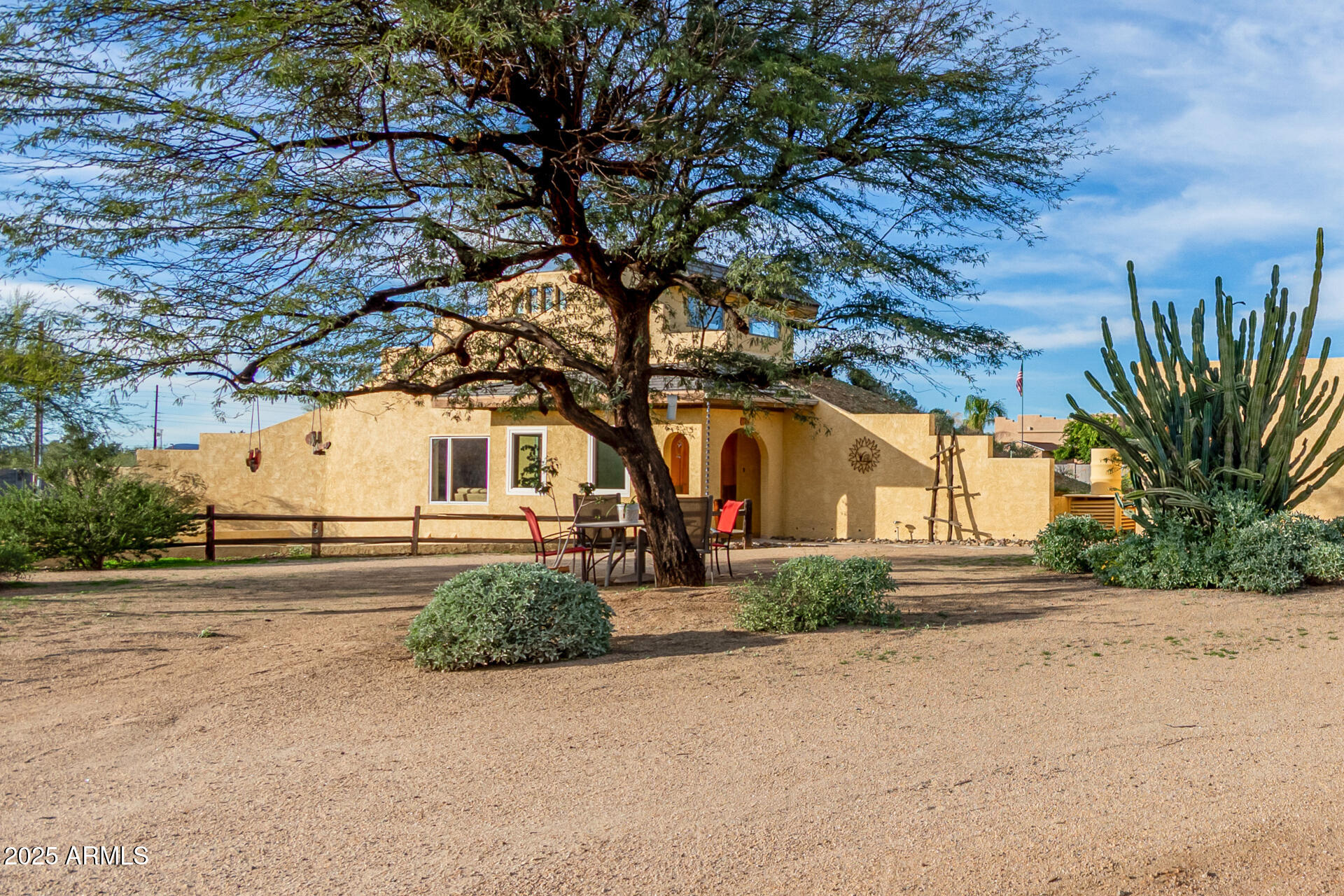 412 West Joy Ranch Road Phoenix, AZ 85086 - Photo 6 of 71 a front view of a house with a yard and garage