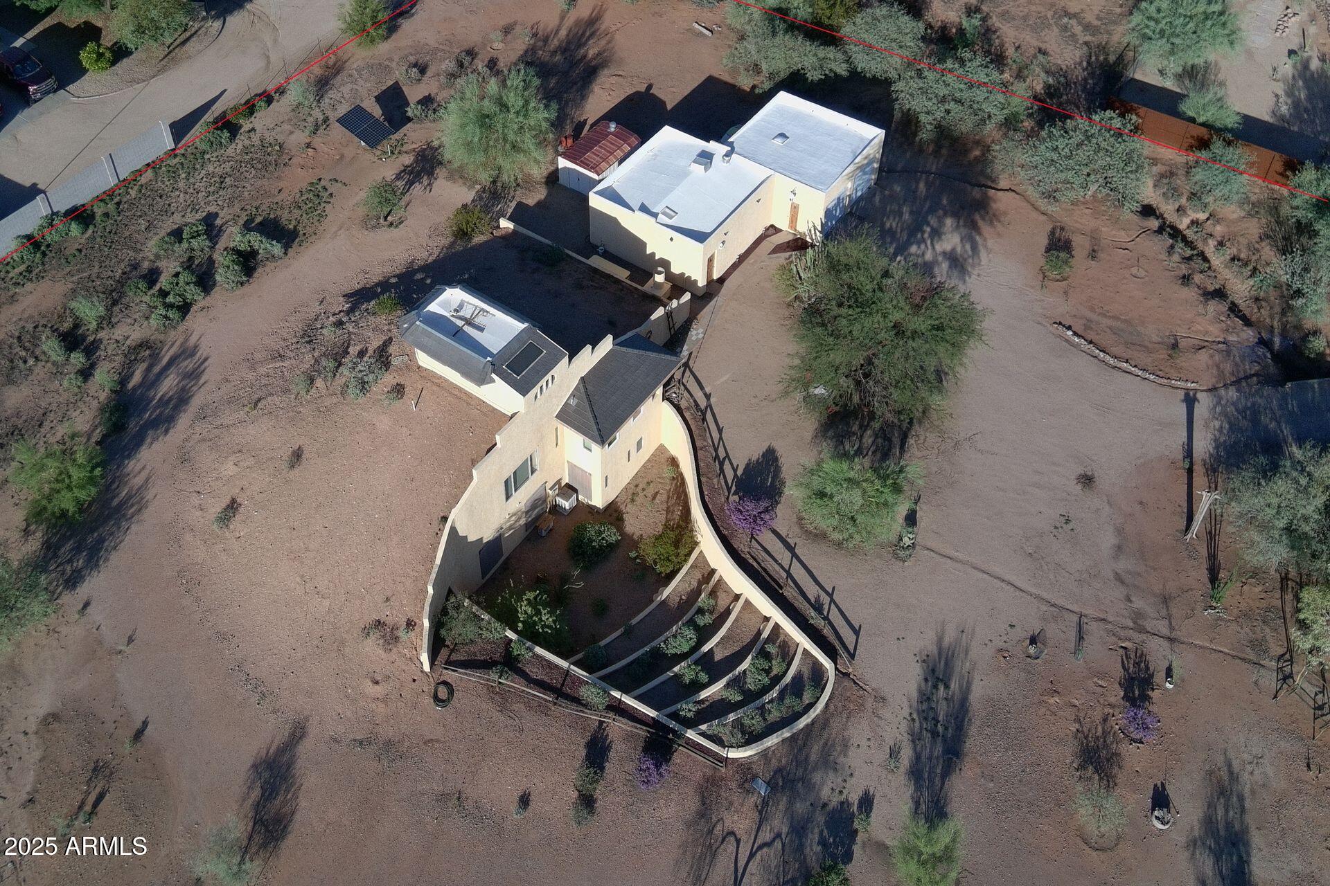 412 West Joy Ranch Road Phoenix, AZ 85086 - Photo 63 of 71 an aerial view of a backyard with outdoor space