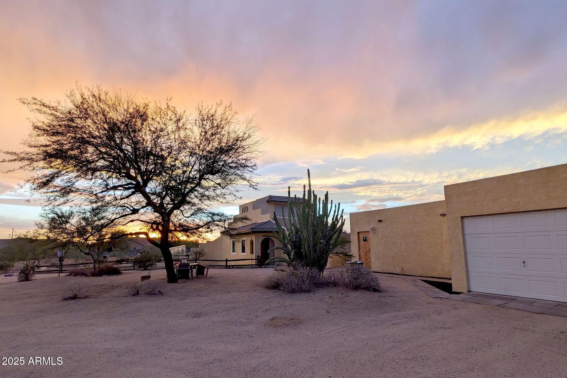 412 West Joy Ranch Road Phoenix, AZ 85086 - Photo 64 of 71 a view of a house with a snow in the yard