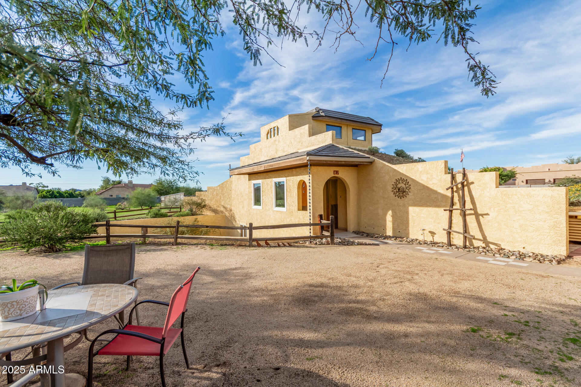 412 West Joy Ranch Road Phoenix, AZ 85086 - Photo 7 of 71 a view of a dinning table and chairs in patio