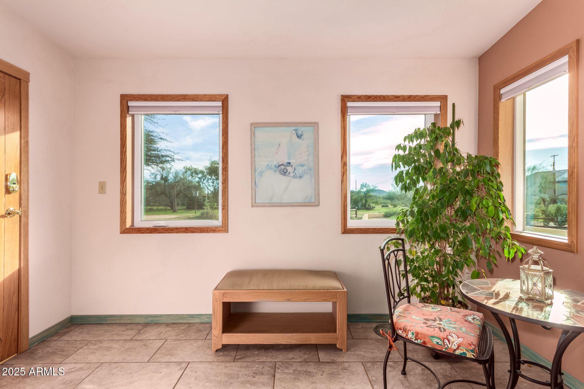 412 West Joy Ranch Road Phoenix, AZ 85086 - Photo 10 of 71 a outdoor living room with furniture and a window