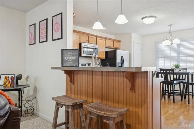 a view of a dining room with furniture