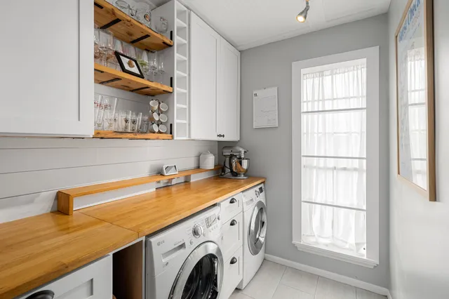 a utility room with dryer and washer