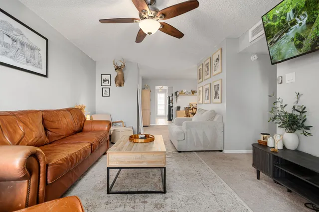 a living room with furniture and a couch