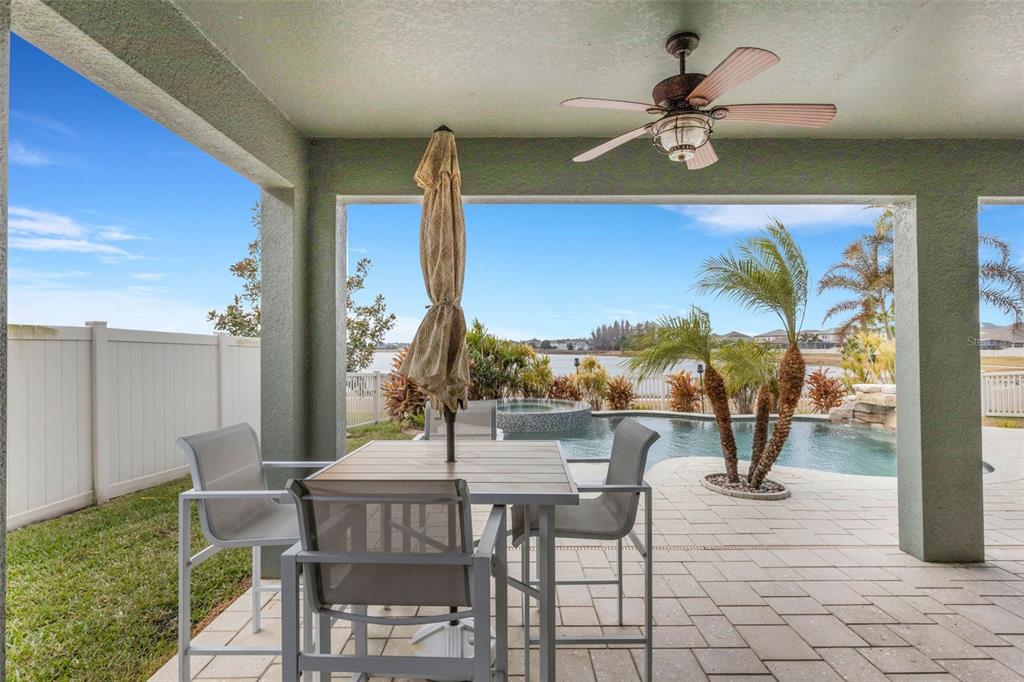 19613 Long Lake Ranch Boulevard Lutz, FL 33558 - Photo 31 of 59 a view of a patio with a table and chairs