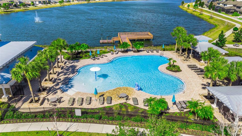 19613 Long Lake Ranch Boulevard Lutz, FL 33558 - Photo 51 of 59 an aerial view of a house with yard swimming pool and outdoor seating