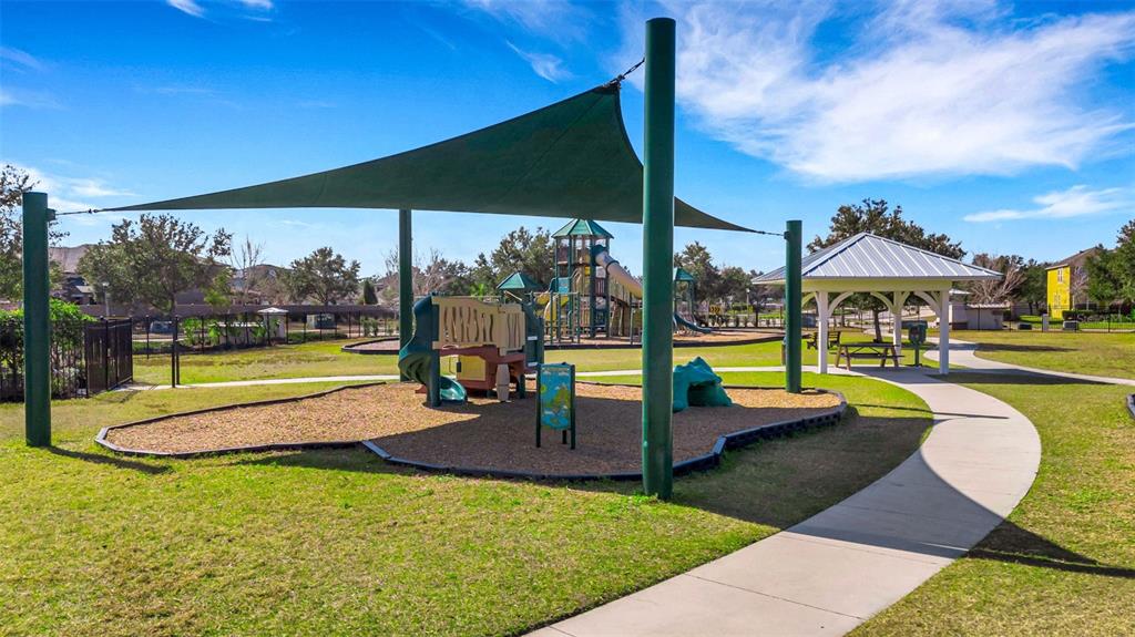 19613 Long Lake Ranch Boulevard Lutz, FL 33558 - Photo 56 of 59 a view of swimming pool with seating area and roof