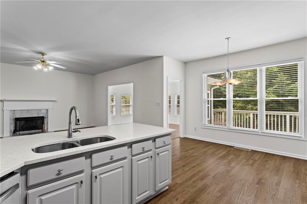 4282 Goldfield Trace, Unit MAIN & 2 Suwanee, GA 30024 - Photo 11 of 28 a kitchen with sink and large window