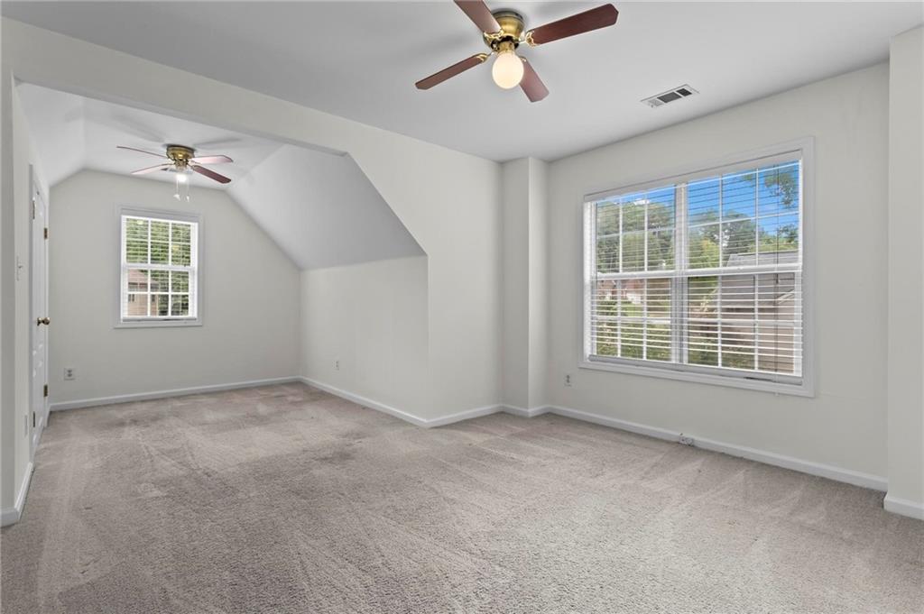 4282 Goldfield Trace, Unit MAIN & 2 Suwanee, GA 30024 - Photo 21 of 28 a view of an empty room with a window